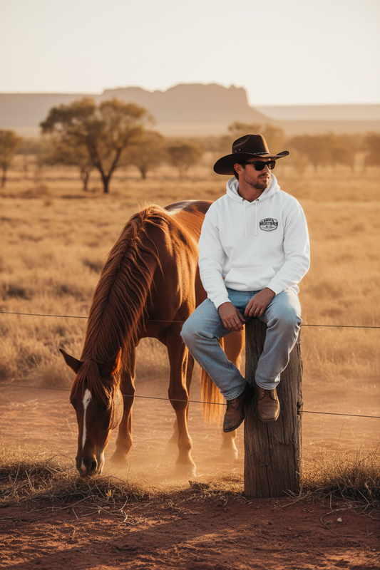 Man in white hoodie with horse
