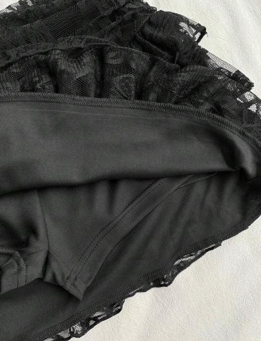 Built-in black shorts beneath the floral lace mini skort