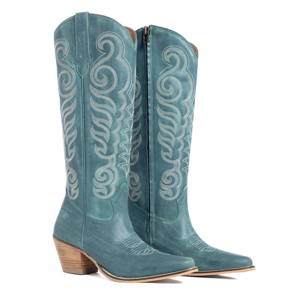Pair of Deep Turquoise Myra Nalejandra boots with light swirl stitching