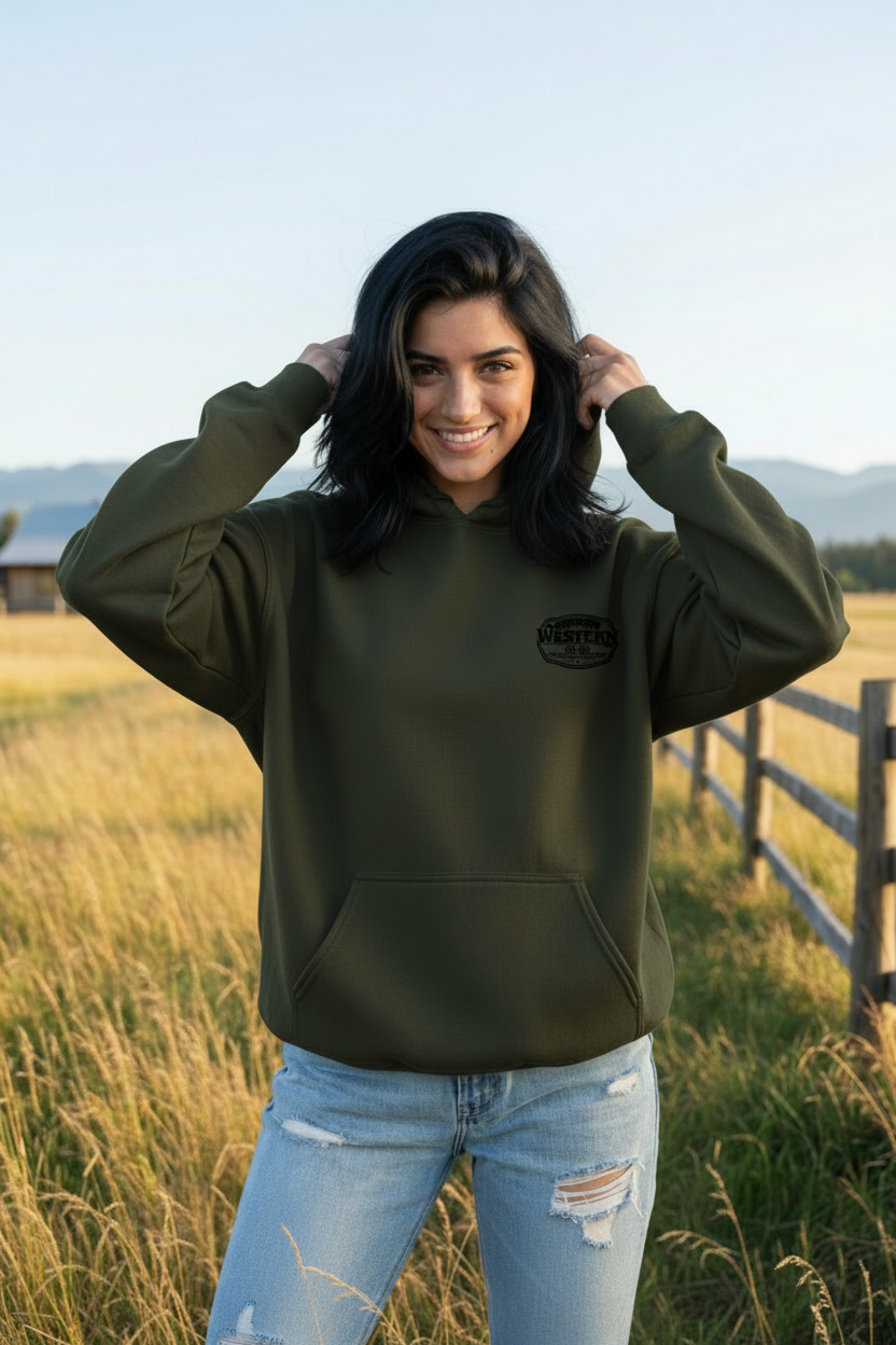 Woman in army green hoodie with black logo